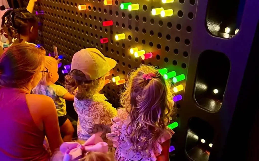 Lite Brite Wall with Kids Playing at Wonderworks
