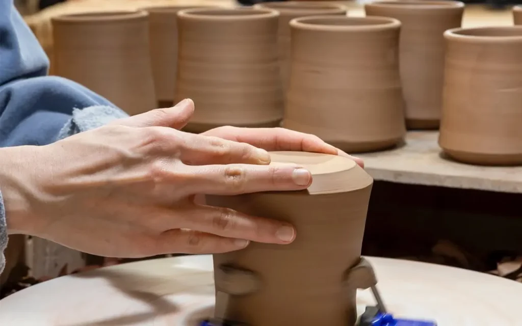 Alewine Pottery Making a Cup