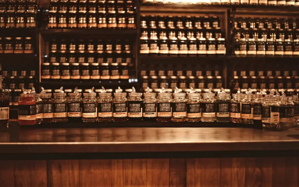 Bottles Lined Up on Bar at Old Forge Distillery