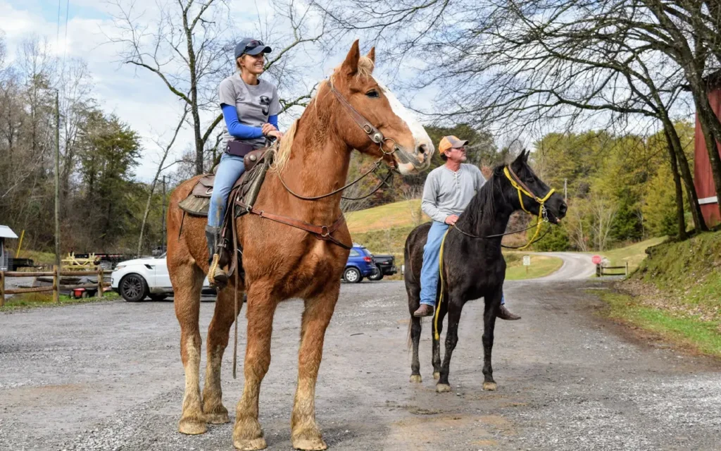 Couple Riding Horses at Smoky Mountain Deer Farm