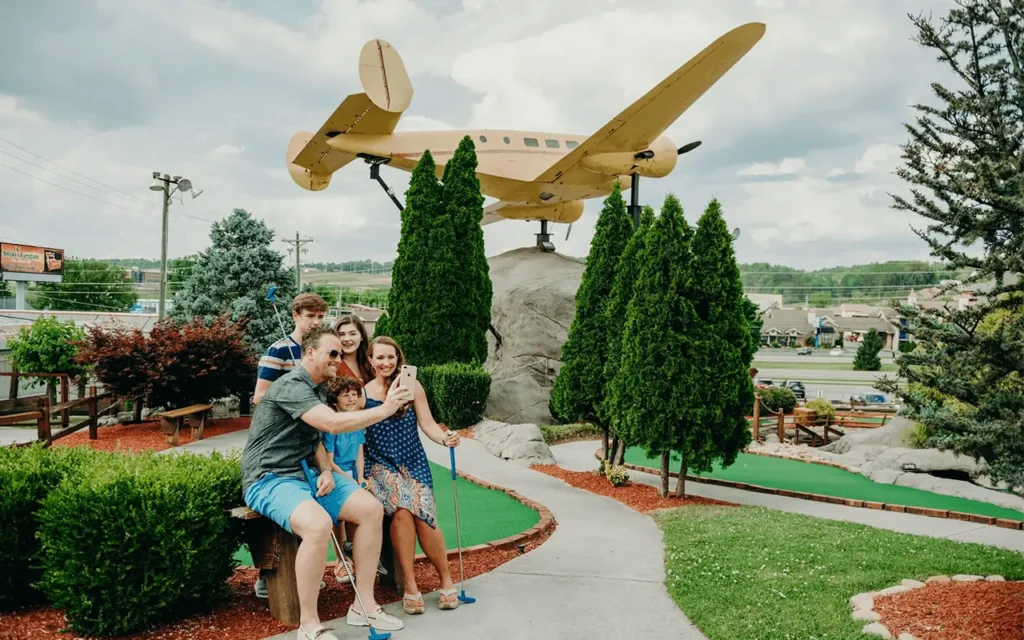 Family Taking a Photo at Lost Treasure Golf