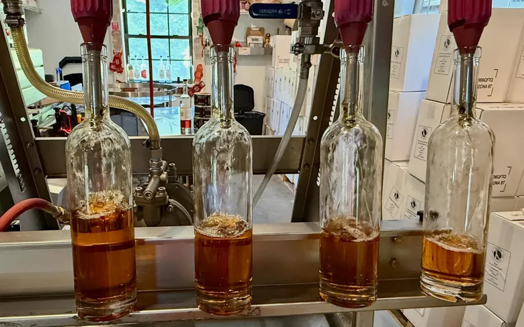 Filling Whiskey Bottles at Kings Family Distillery