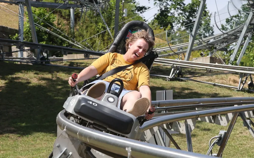 Happy Rider On Coaster at Rocky Top Mountain Coaster