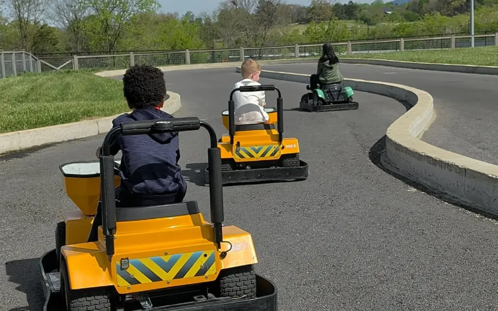 Kids Racing Tractors at Dig N Zone Theme Park