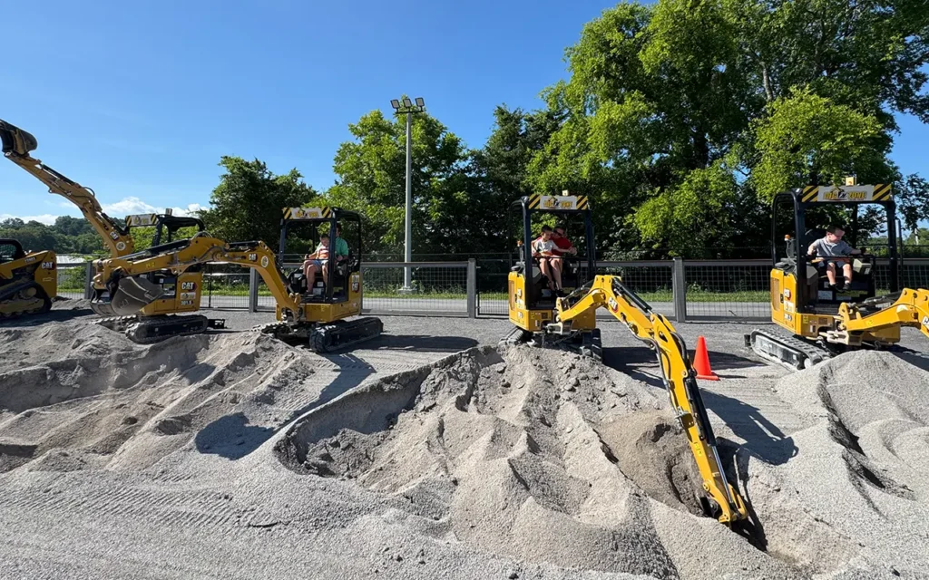Kids Using Excavator at Dig N Zone Theme Park