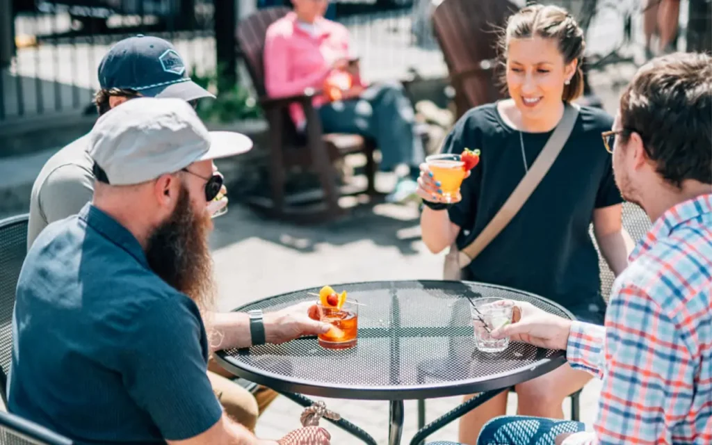People Sitting on Patio at Old Forge Distillery