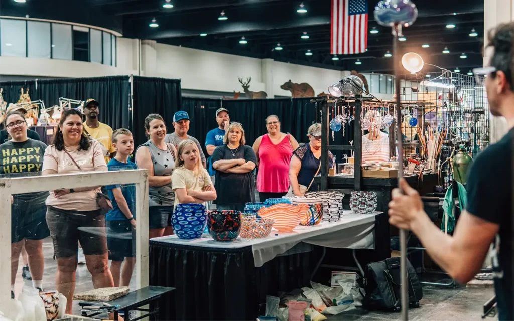 People watching glass blowing at Gatlinburgs Craftsmens Fair