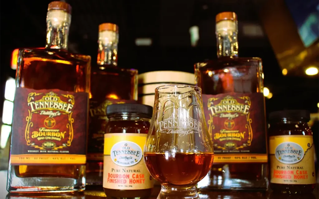 Whiskey Bottles and Glasses on Display At Old Tennessee Distilling Co
