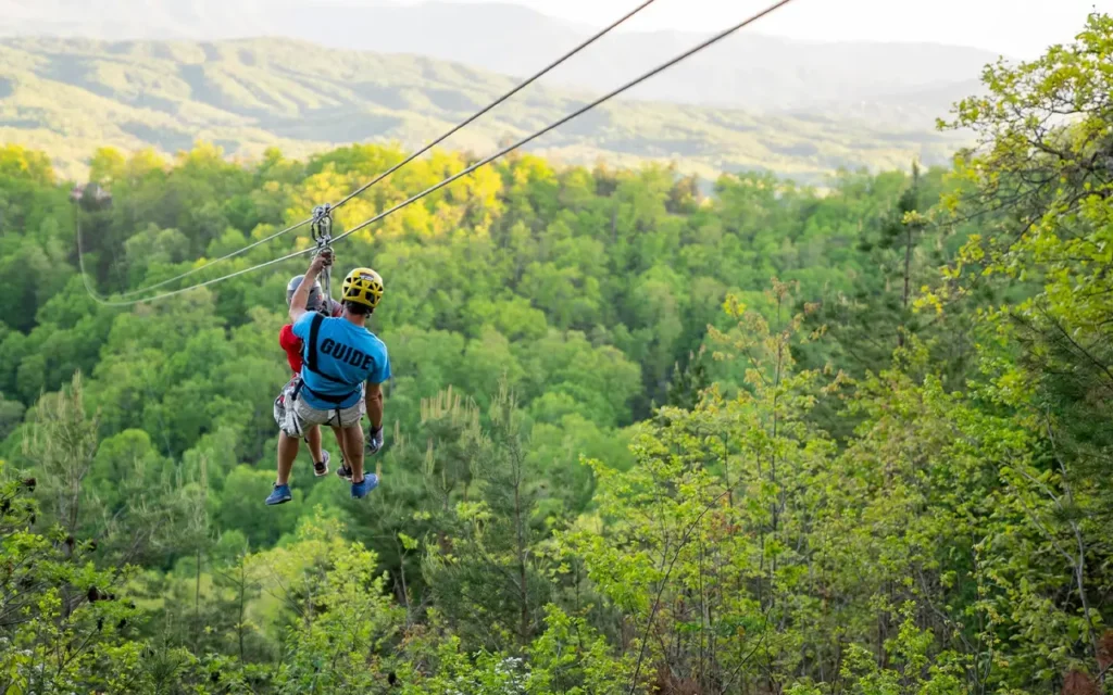 Zipline Guide with Rider at Legacy Mountain Ziplines